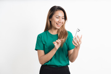 Portrait of asian businesswoman using mobile phone isolated over white background.