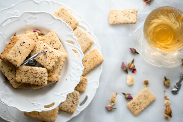 Tea blossom cookies on a white plate