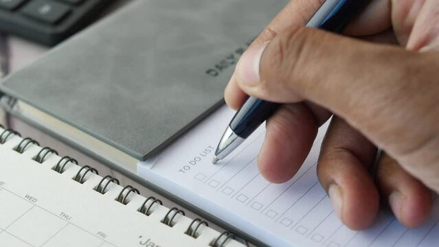 writing goals and action plan on a diary 
