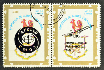 Cancelled postage stamps printed by Equatorial Guinea, that show overprinted First flight Paris-Rio...