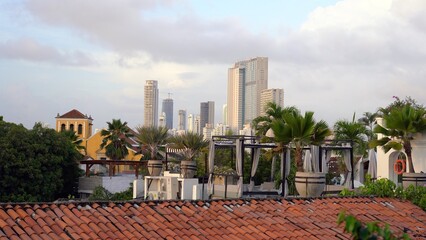 Colombia , South America Cartagena de Indias 2022 -  Unesco  Heritage World for the Spanish colonial city center  - the rooftop of the houses and the new skyline with skyscrapers  view from Getsemani