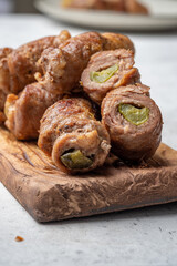 Meat rolls stuffed with mustard and pickled cucumber braised in gravy