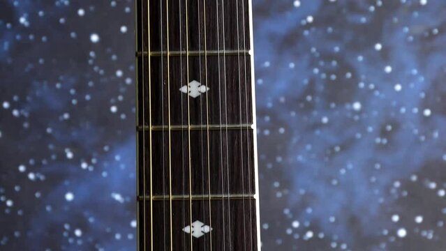 12 string guitar with camera movement down
