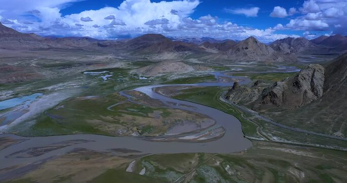 Dunes and Himalayas at the source of the Yarlung Zangbo River in Zhongba County, Xigaze, Tibet