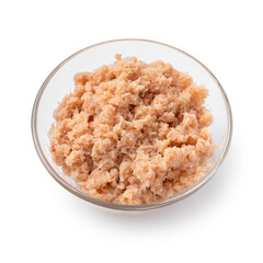Glass bowl with canned crabmeat close up isolated on white background