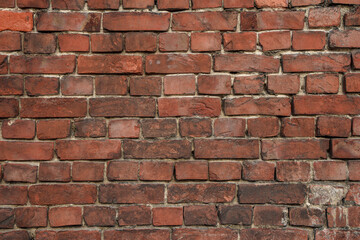 Red brick wall background close up