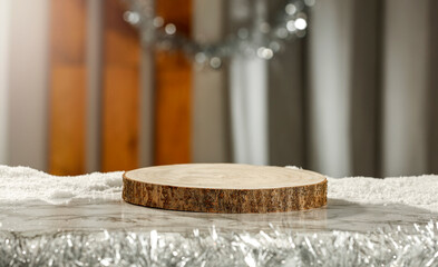 Pedestal on the table with snow in a Christmas mood and free space