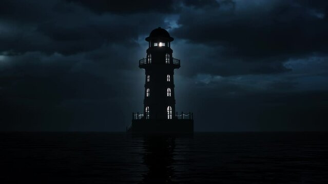 The light beam from the silhouette of a solitary lighthouse at night.