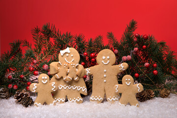 Ginger Bread Family on a Christmas Festive Background - 551594222