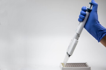 worker with a micropipette