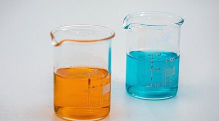 glass of water on blue