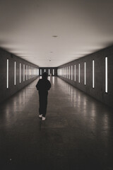 teenager walking through subway station