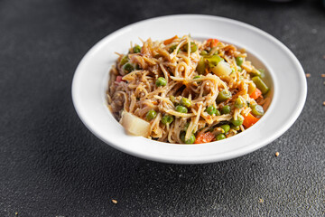rice noodles vegetables veggie vegan food vegetarian asian food snack meal food snack on the table copy space food background rustic top view
