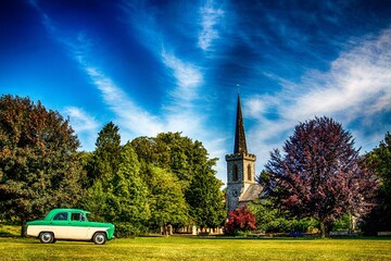 View of a Ford Consul Mk1 parked in the greenery before the old English church