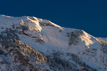 Mountain ridge in the early morning winter sun