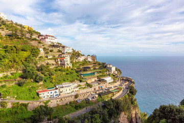 Touristic Town, Amalfi, on Rocky Cliffs and Mountain Landscape by the Tyrrhenian Sea. Amalfi Coast, Italy.