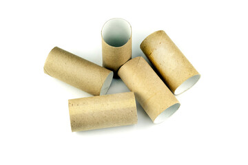 Empty toilet paper rolls. Paper waste for recycling. Cardboard core made of papyrus paper. Empty bath towels on a white background.