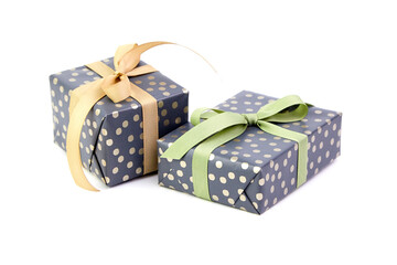 Gift boxes with ribbon bow isolated on white. Wrapped Christmas or birthday green color gift boxes