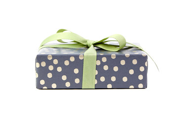 Christmas gift box with ribbon bow isolated on white. Wrapped green color gift box for holiday...