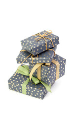 Stacked gift boxes for present isolated on white. Green gift boxes pile. Christmas or birthday gift boxes group
