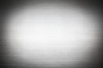 A Brick wall background studio indoors