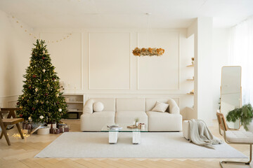 Bright interior of the room with an elegant Christmas tree in Scandinavian style