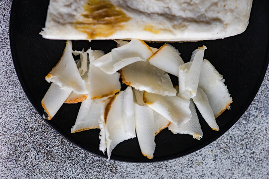 Overhead view of a plate of traditional Ukrainian cured pork fat (salo)