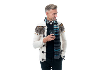 man in scarf holding morning coffee for holiday. mature man in sweater with coffee. mature man