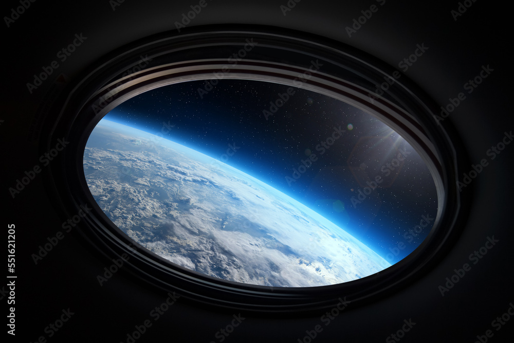 Wall mural view from porthole of a spaceship to earth planet. this image elements furnished by nasa.