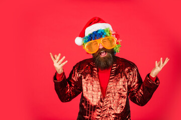 Sorry Santa, Naughty just feels Nice. Bearded man celebrate christmas. Christmas party entertainment. Christmas spirit. Cheerful clown colorful hairstyle. Funny man with beard. Winter holidays