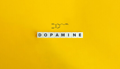 Dopamine (feel-good hormone) Skeletal Formula and Word on Block Letter Tiles on Yellow Background.