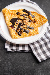 crepe sweet dessert vanilla flavor thin pancakes fresh crepe suzette  snack meal food snack on the table copy space food background rustic top view