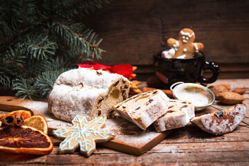 Fruit bread with cinnamon and dried fruits with winter festive symbols