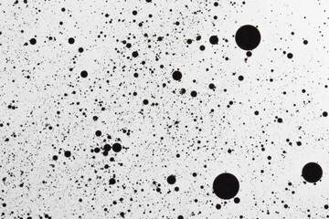 Abstract background of black paint and oil on white background