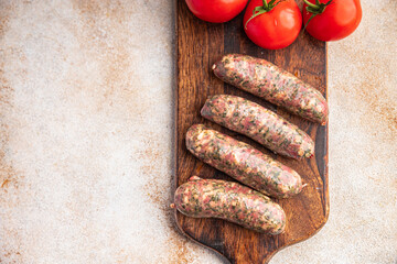 meat sausage green herb fresh ground pork, beef, chicken meal food snack on the table copy space food background rustic top view