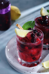 Cold refreshing drink with fresh berry and ice