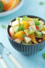 A bowl with fresh fruit salad