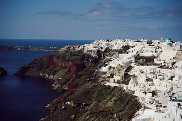 View of Oia with traditional white buildings, Santorini, Greece