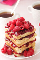 Sandwiches with peanut butter and raspberry jam