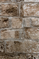 Background texture of old stone wall with cement pointing