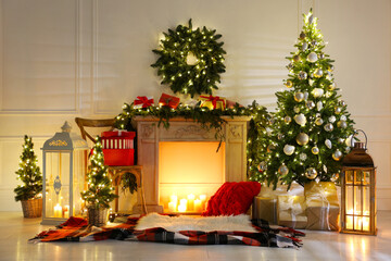 Obraz premium Beautiful Christmas themed photo zone with fireplace and fir decor