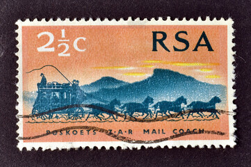 Cancelled postage stamp printed by SOUTH Africa that shows Mail Coach from 1869, 100 years stamps of the South African Republic, circa 1969.