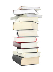 Many different books stacked on white background