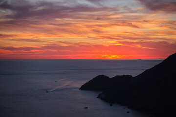 Fototapeta na wymiar Sunset over the Ocean at Golden Gate Bay in San Francisco