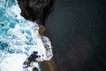 Epic natural pool with great wave. View from drone in Madeira
