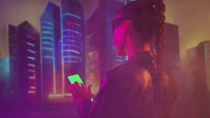 Portrait of cyberpunk girl with a smartphone. Beautiful young woman on the background of city...