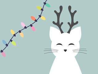 Christmas cute funny cat reindeer and Christmas lights on blue background.
