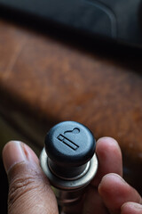 shape of the cigarette lighter in the car