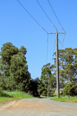 Obraz premium power lines on country road near Daylesford