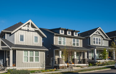 Beautiful Home Exterior design of residential fronts. Neighborhood new modern houses residential architecture